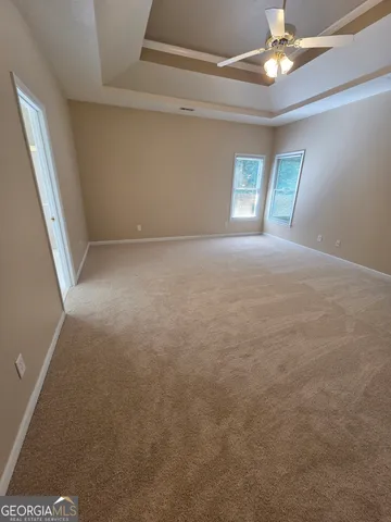 a view of a refrigerator in a kitchen
