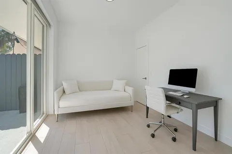 a view of a workspace with a bathroom