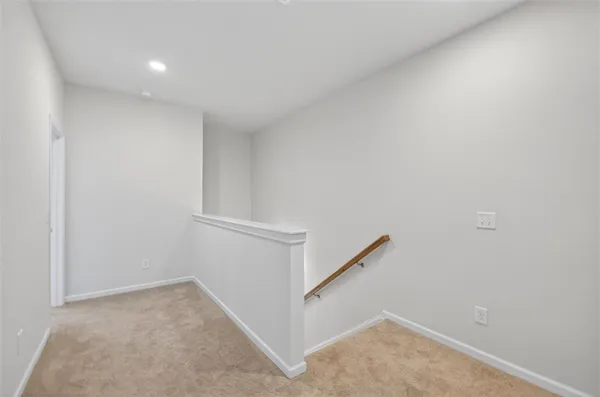 a view of hallway with stairs