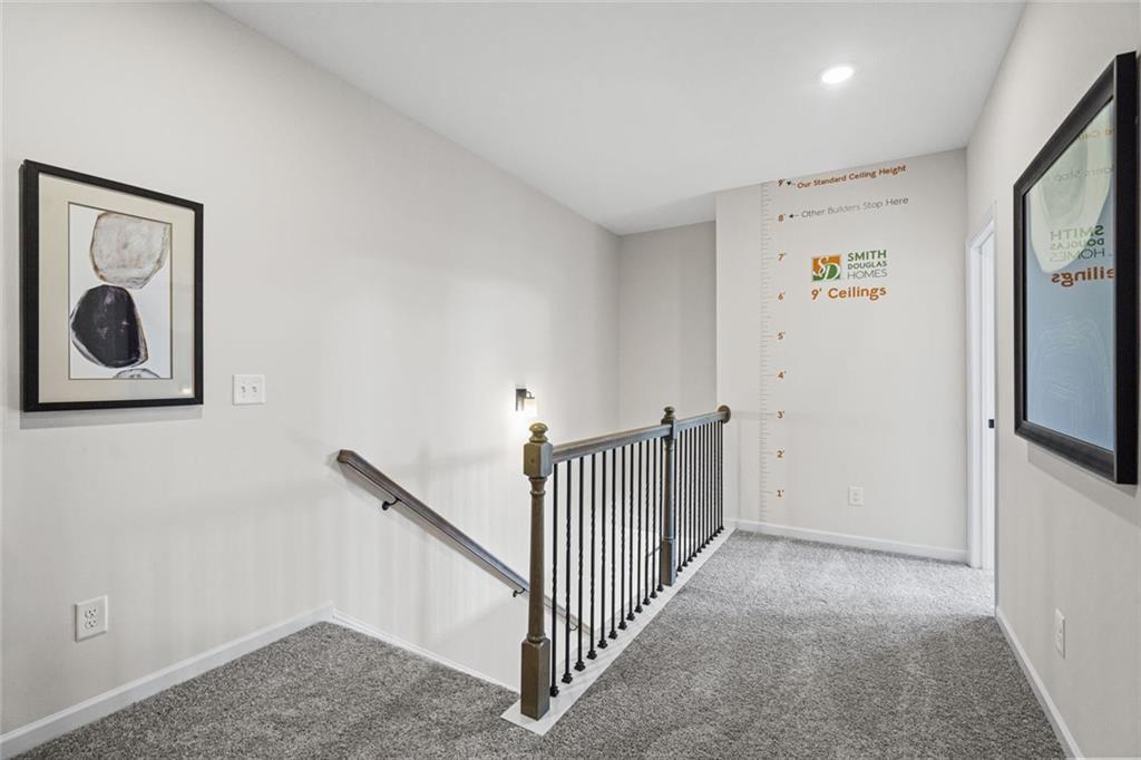 312 Caroline Place, Unit 99 Villa Rica, GA 30180 - Photo 17 of 24 a view of hallway with stairs