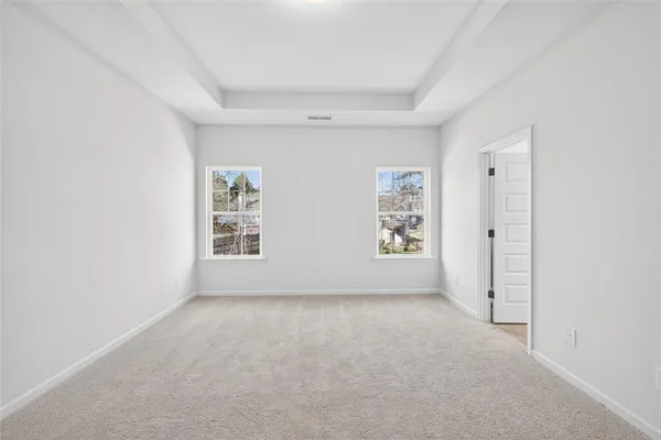 an empty room with windows
