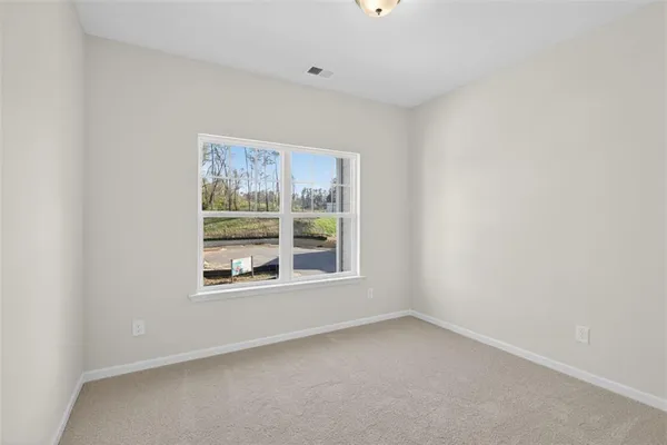 an empty room with a window