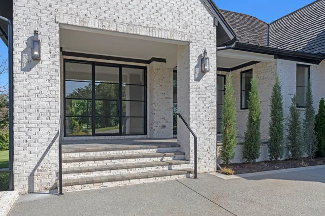 a view of a kitchen with dining table and chairs