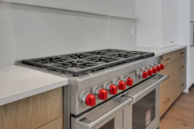 a bedroom with bed and a window