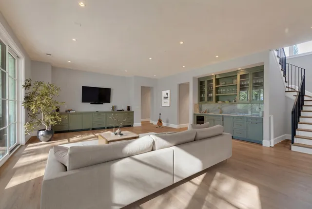 a view of a park with large trees