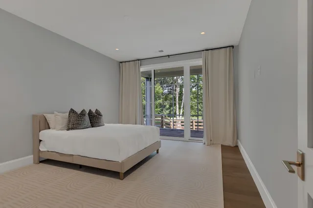 an aerial view of house with yard swimming pool and outdoor seating