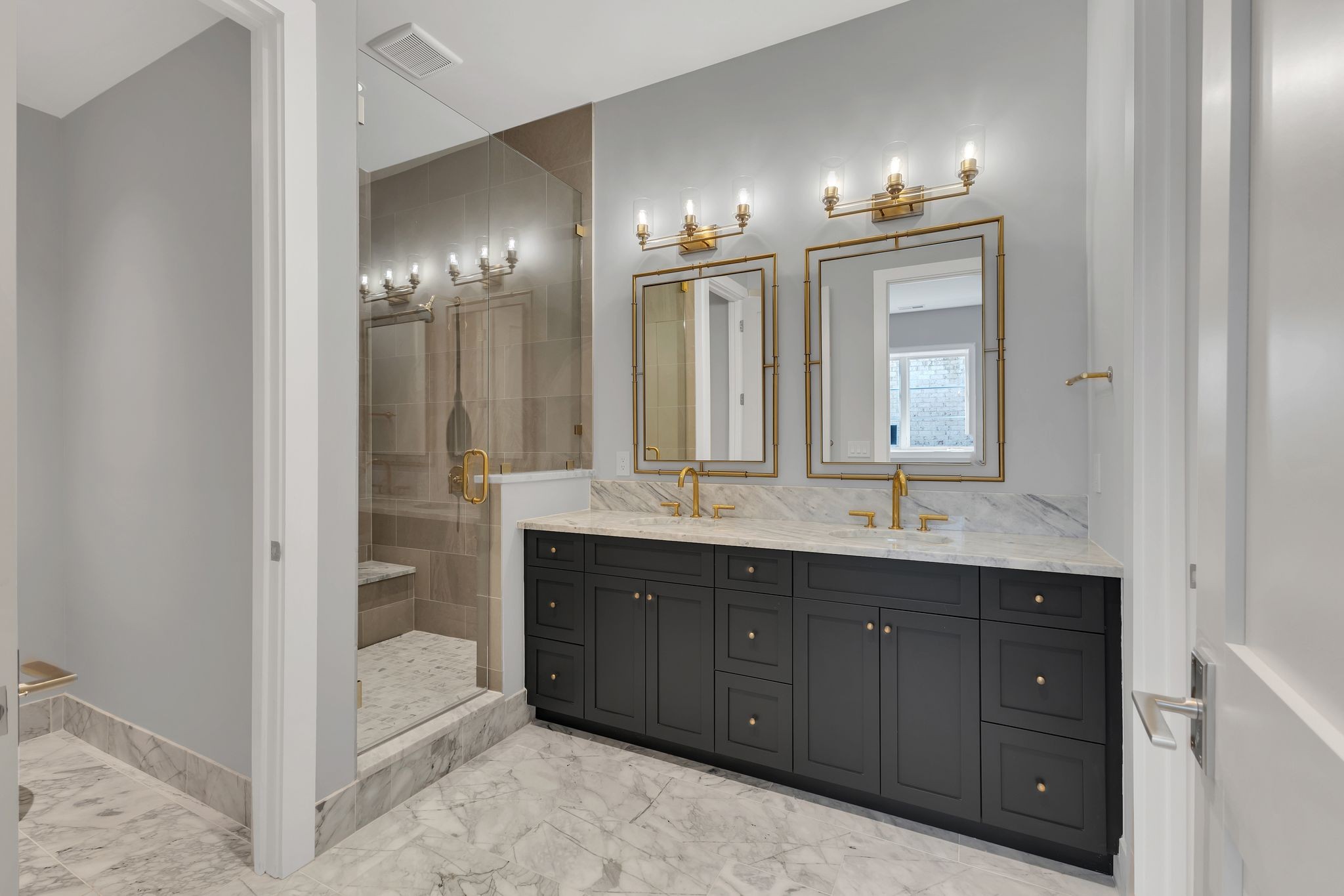 7577 Whiskey Road College Grove, TN 37046 - Photo 51 of 93 a bathroom with double vanity and a mirror
