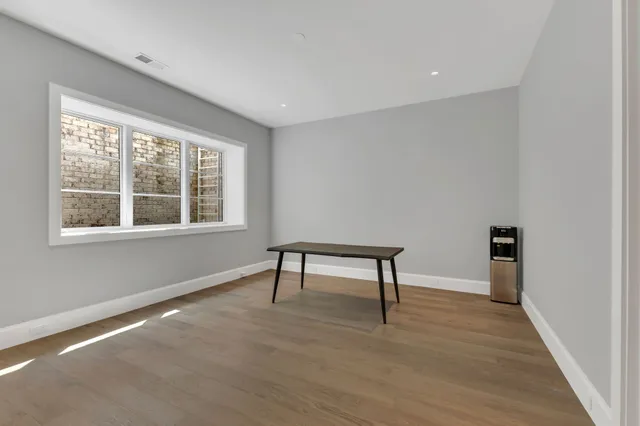 a view of a lake with a yard