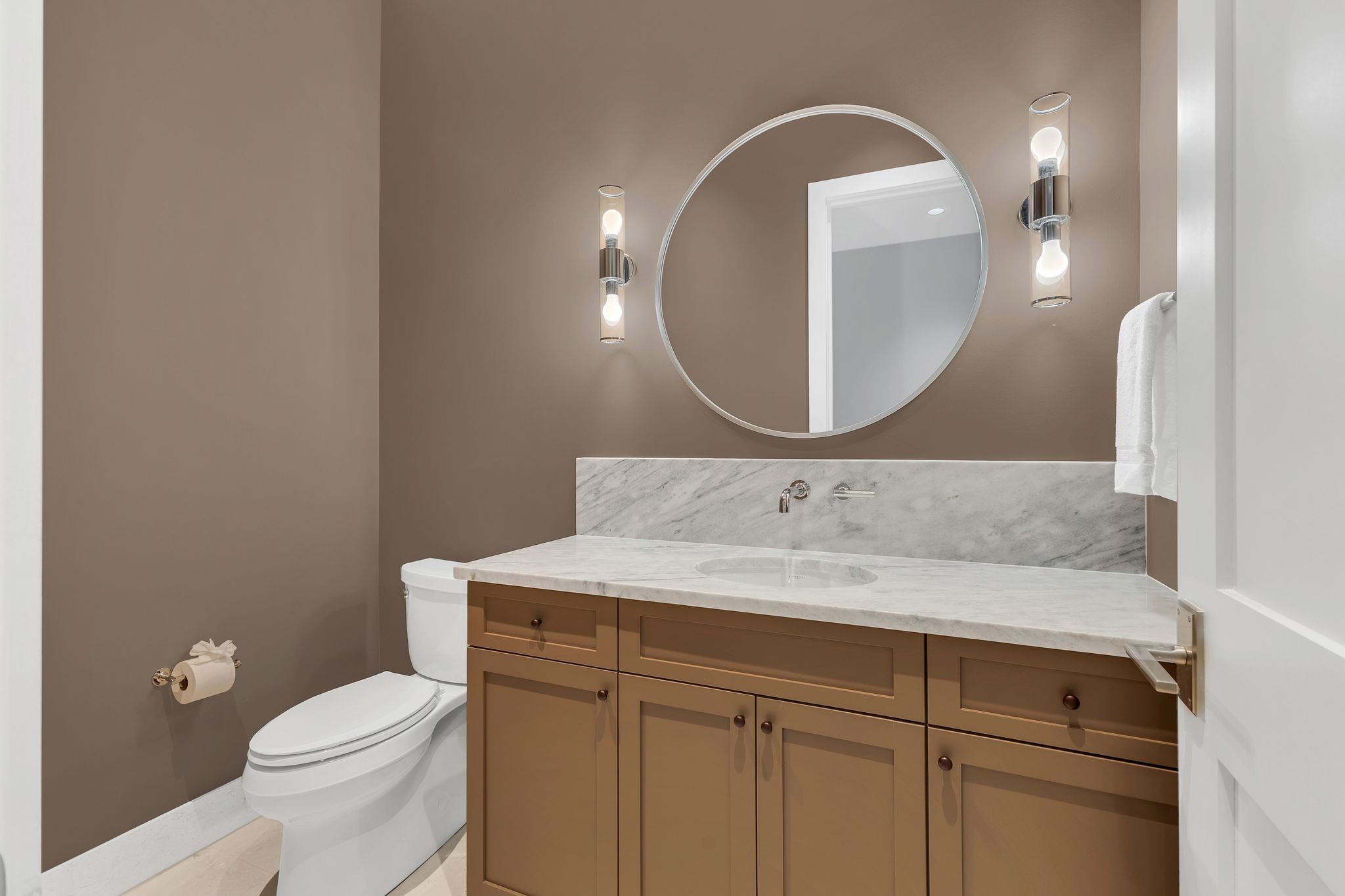 7577 Whiskey Road College Grove, TN 37046 - Photo 54 of 93 a bathroom with a granite countertop toilet a sink and mirror