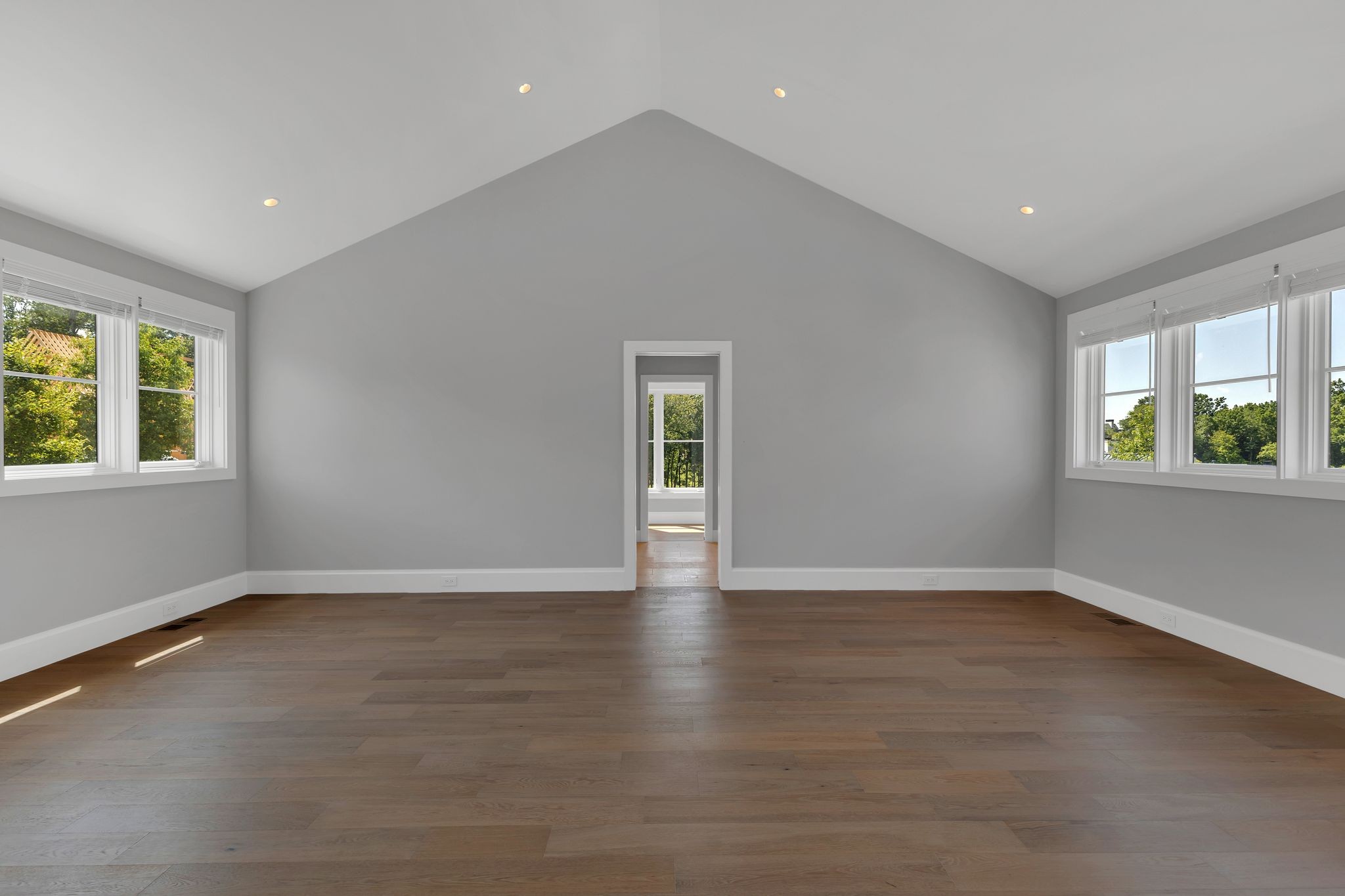 7577 Whiskey Road College Grove, TN 37046 - Photo 57 of 93 a view of an empty room with wooden floor and a window