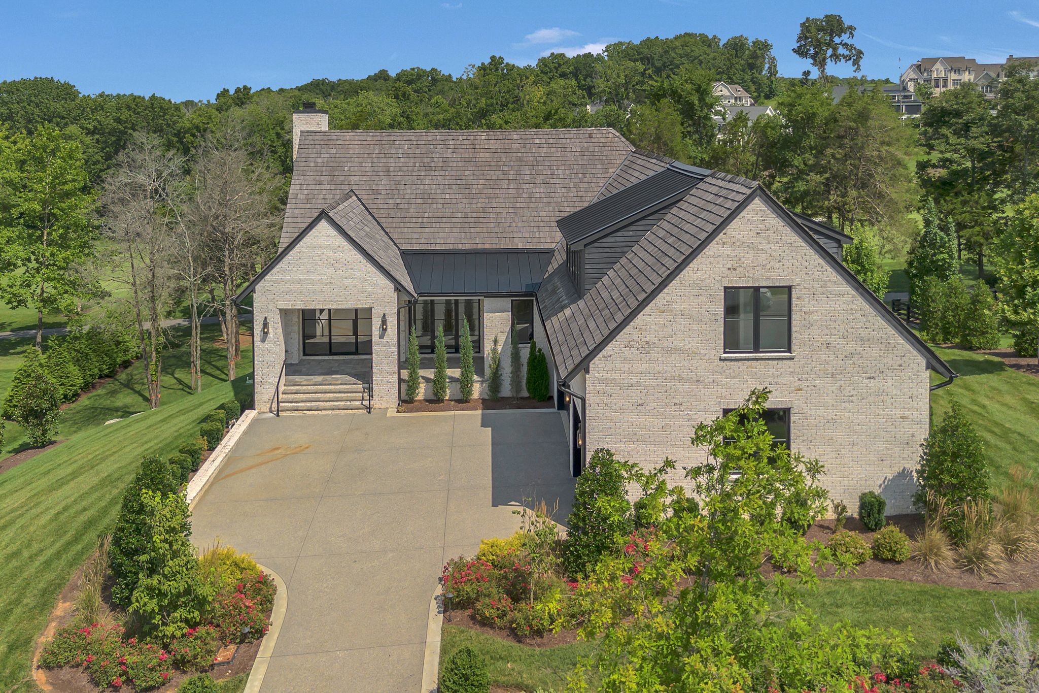 7577 Whiskey Road College Grove, TN 37046 - Photo 8 of 93 a aerial view of a house with a yard and potted plants