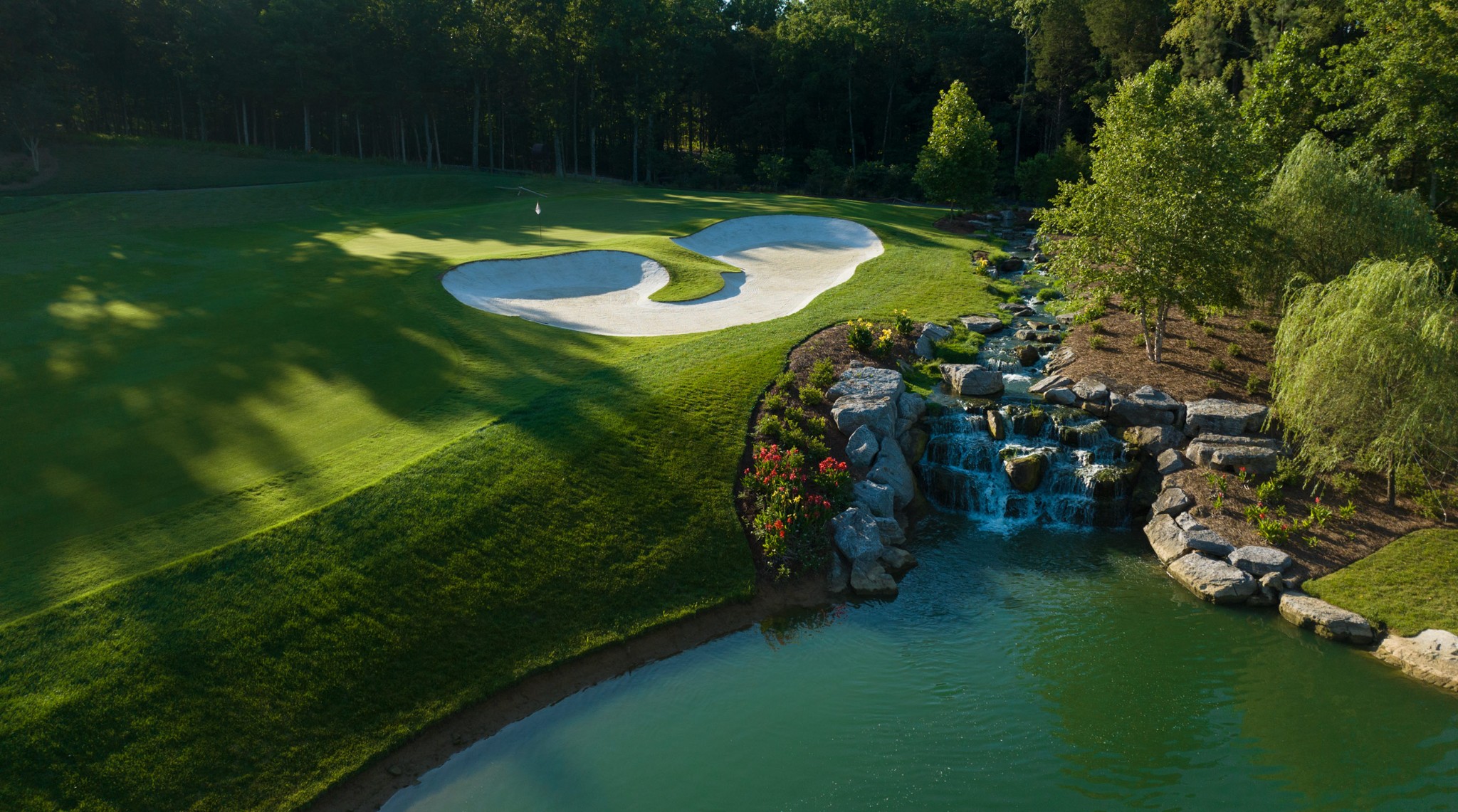 7577 Whiskey Road College Grove, TN 37046 - Photo 88 of 93 a view of a golf course with a lake