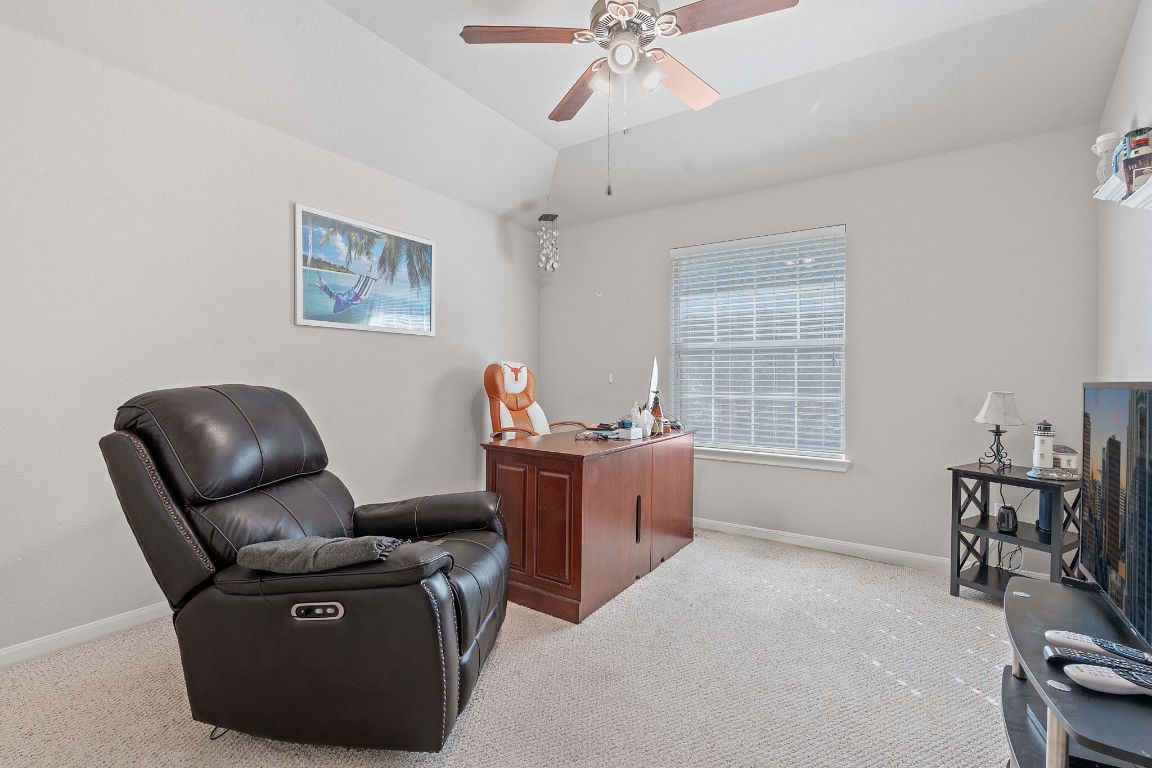 1024 Portchester Castle Path Pflugerville, TX 78660 - Photo 14 of 40 Office featuring light colored carpet, lofted ceiling, and a ceiling fan