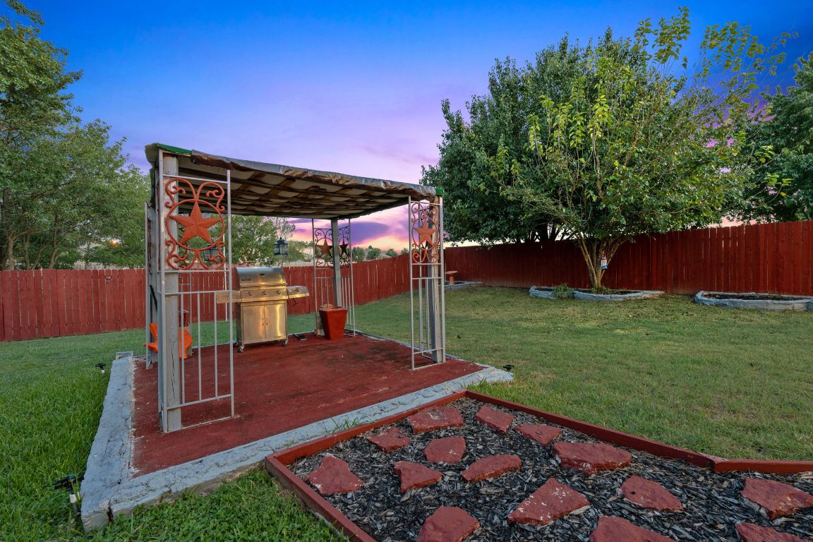 1024 Portchester Castle Path Pflugerville, TX 78660 - Photo 2 of 40 View of fenced backyard