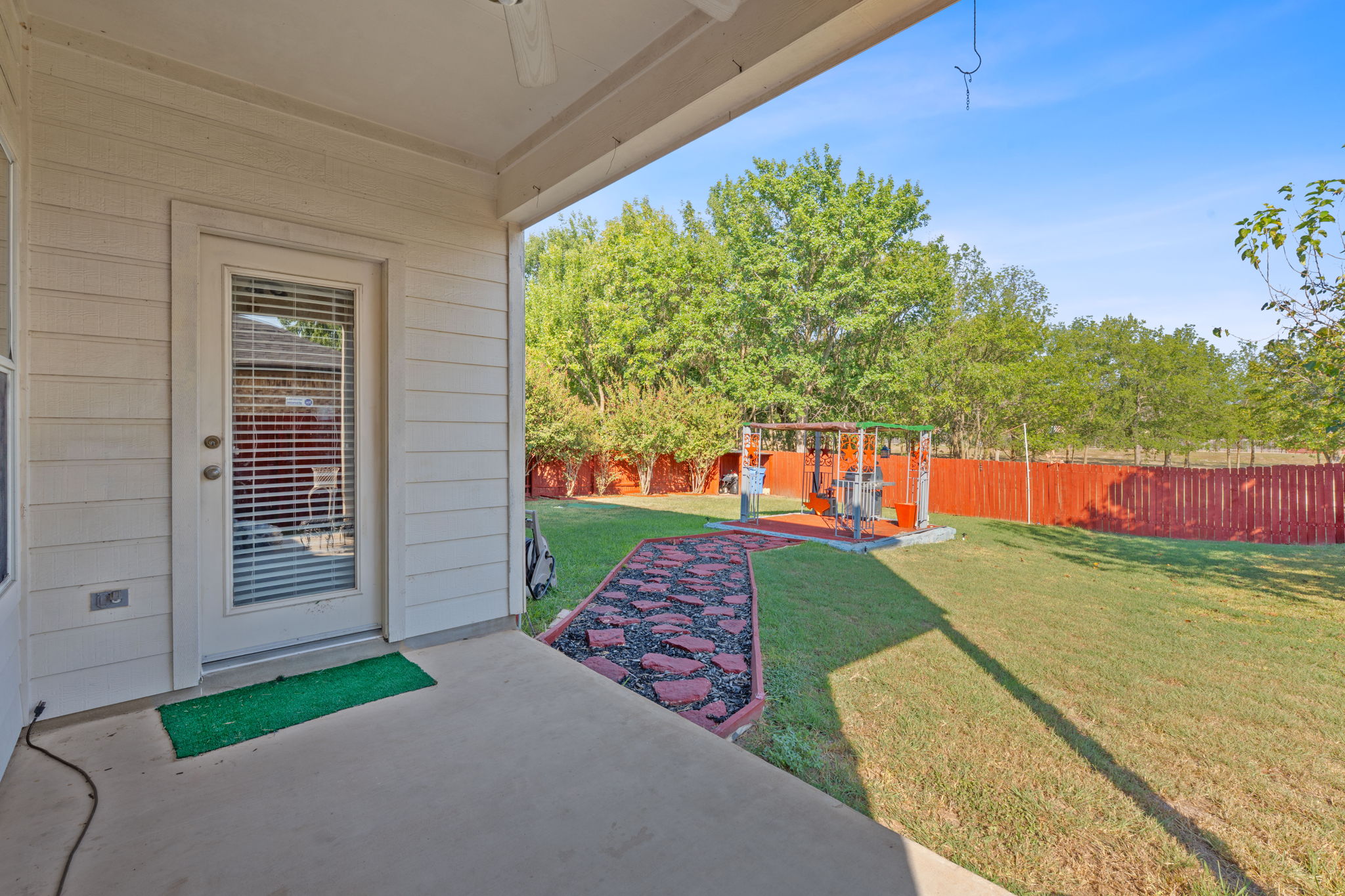1024 Portchester Castle Path Pflugerville, TX 78660 - Photo 25 of 40 a view of a backyard with garden