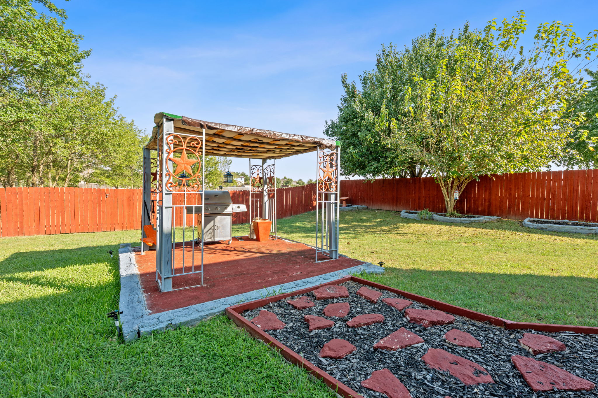 1024 Portchester Castle Path Pflugerville, TX 78660 - Photo 29 of 40 a view of a backyard with sitting area
