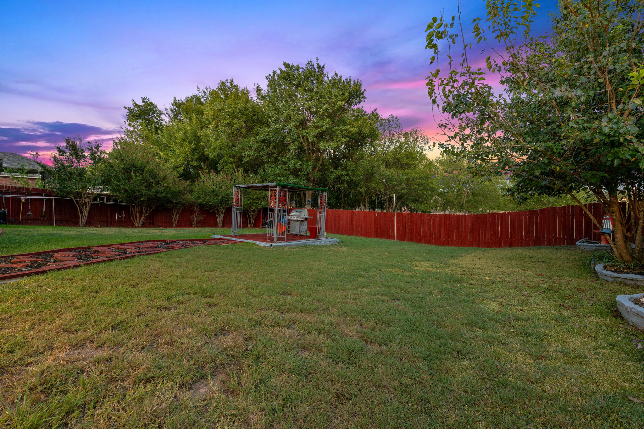 1024 Portchester Castle Path Pflugerville, TX 78660 - Photo 37 of 40 a view of garden with deck and a trees
