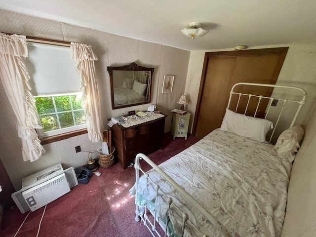 39 Cowper Road Chesterfield, MA 01012 - Photo 8 of 13 a bed room with a bed window and mirror