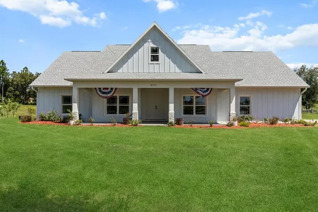 front view of a house with a garden