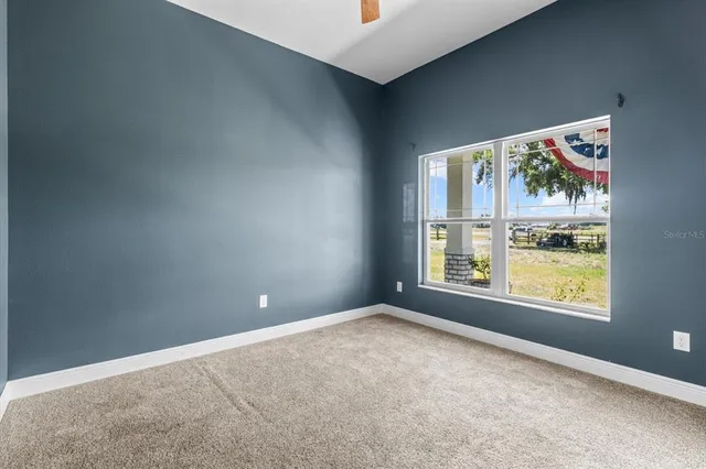 an empty room with windows