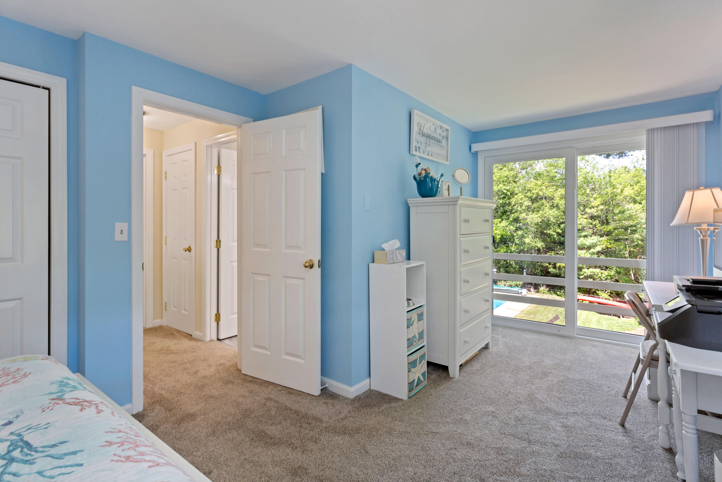 138 Gunstock Road Osterville, MA 02655 - Photo 24 of 47 a view of a bedroom with workspace and windows