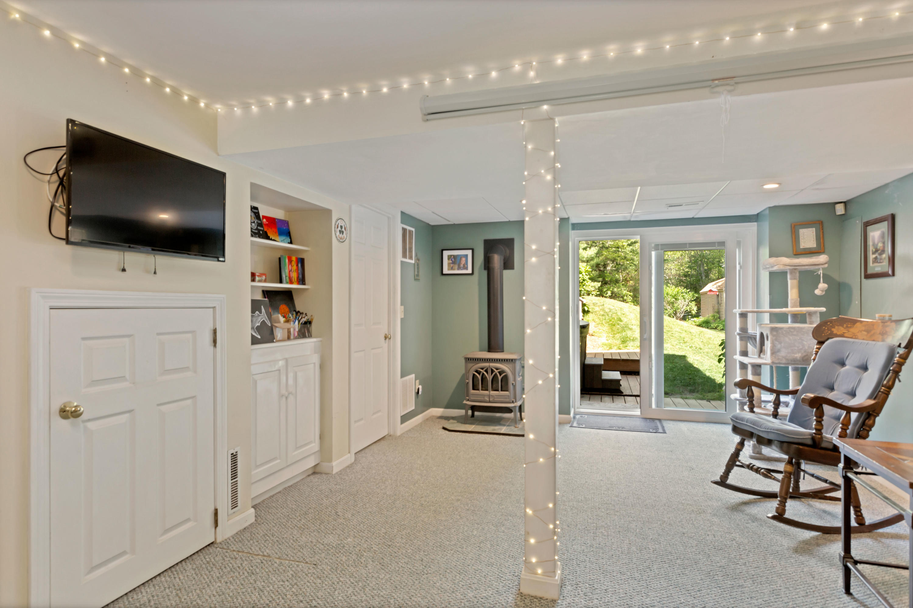 138 Gunstock Road Osterville, MA 02655 - Photo 28 of 47 a living room with furniture and a flat screen tv