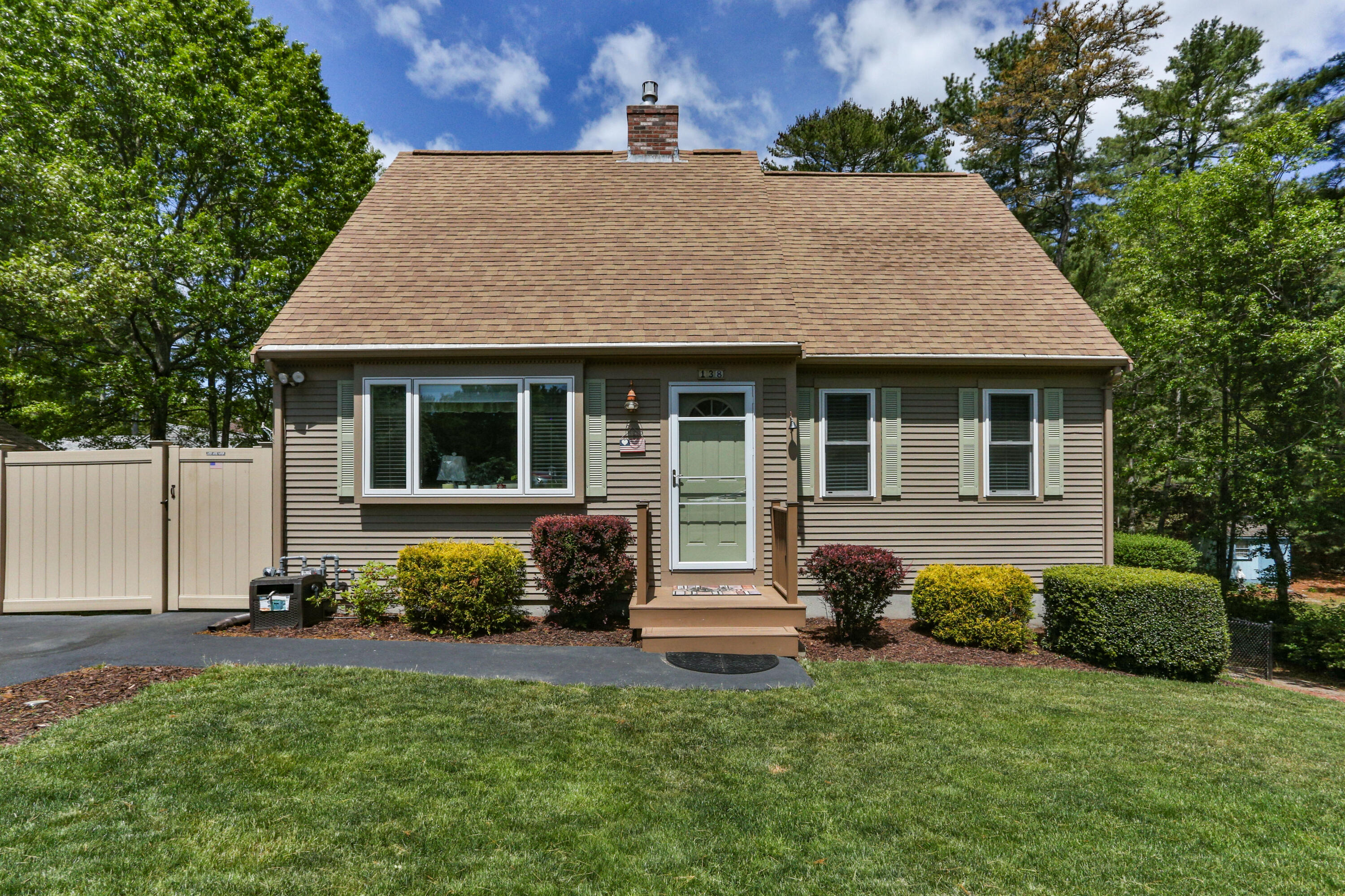 138 Gunstock Road Osterville, MA 02655 - Photo 3 of 47 a house that has a lot of plants in it