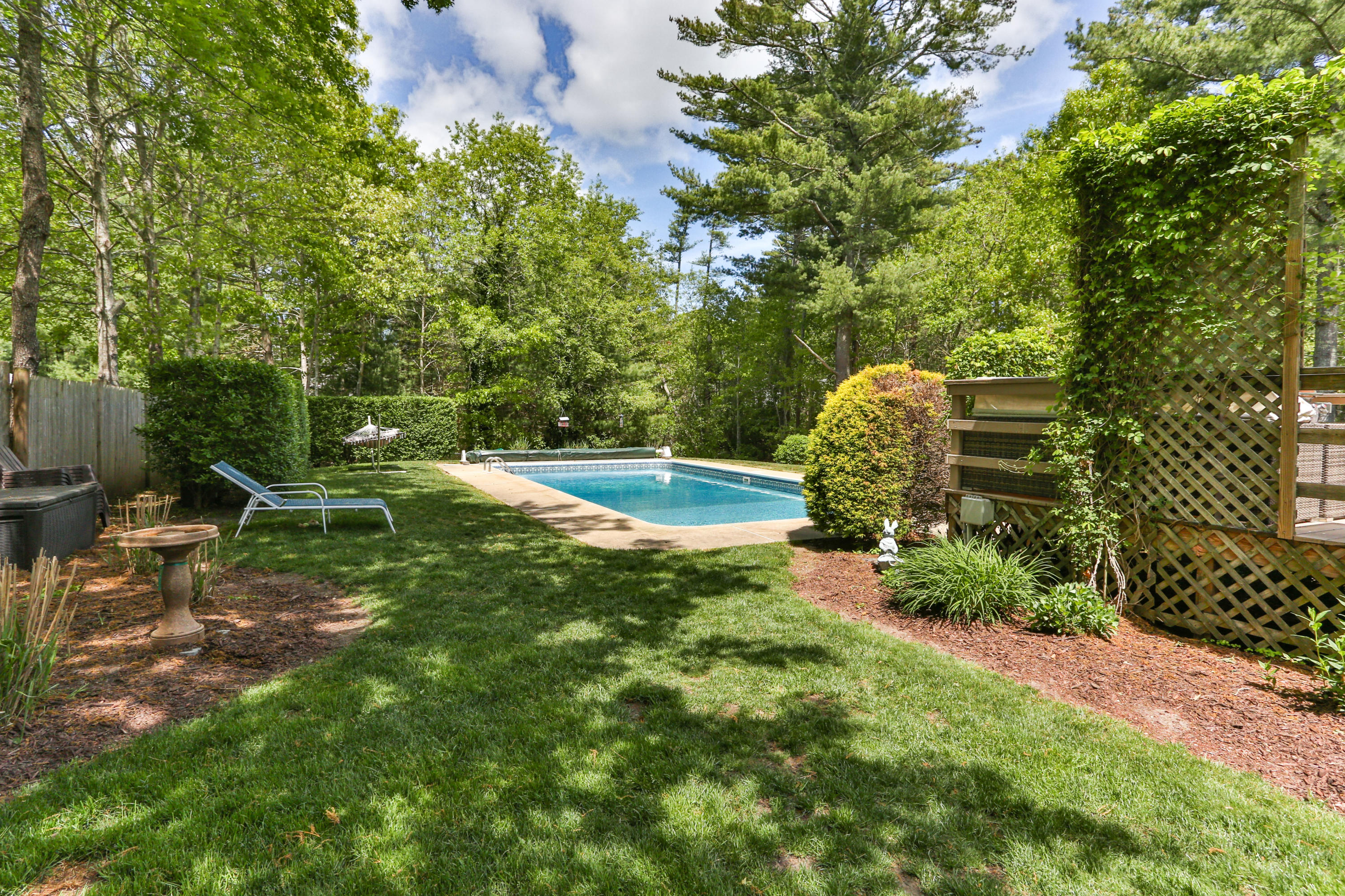 138 Gunstock Road Osterville, MA 02655 - Photo 31 of 47 a view of backyard with green space