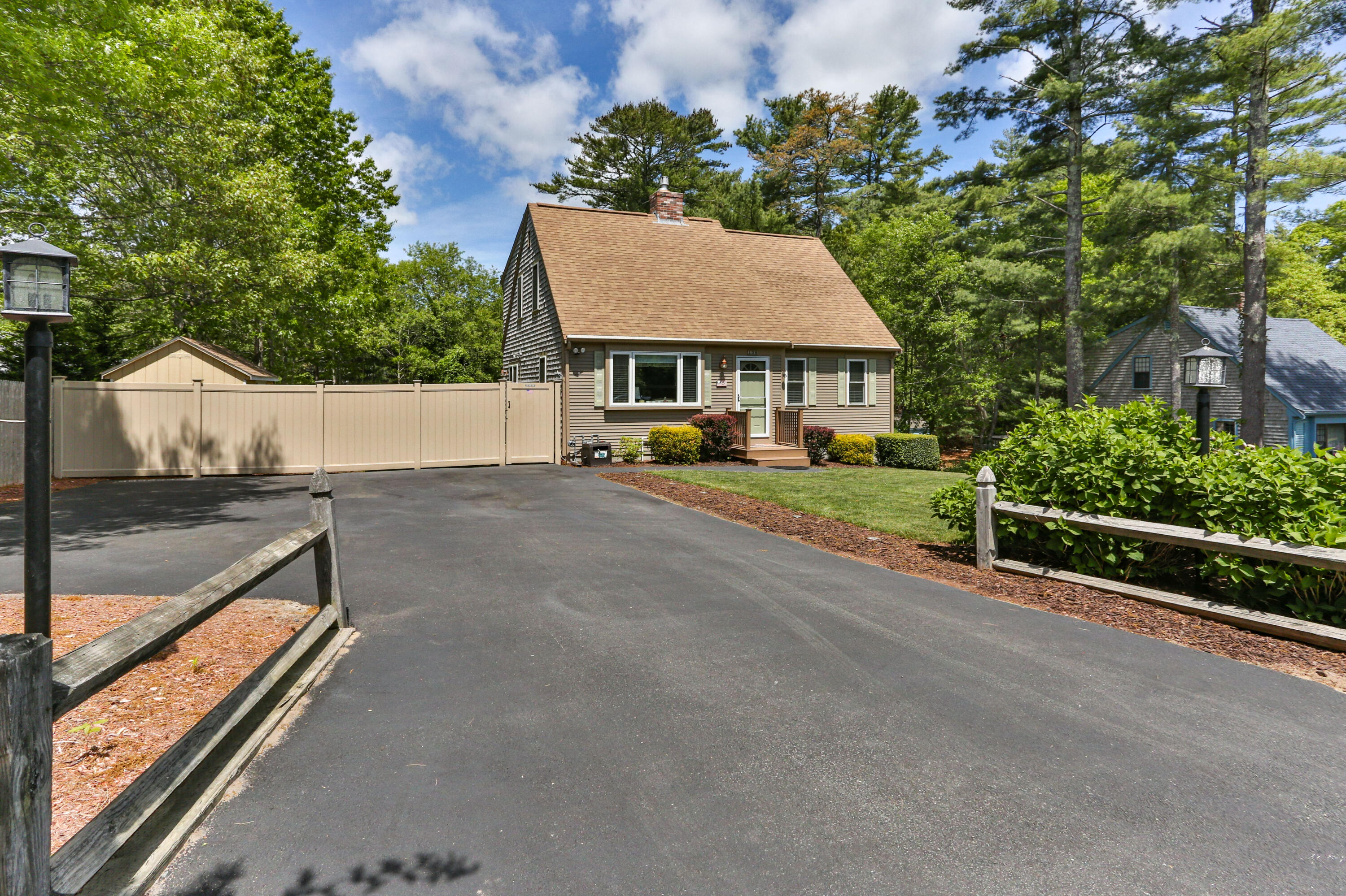 138 Gunstock Road Osterville, MA 02655 - Photo 43 of 47 a view of a house with a street