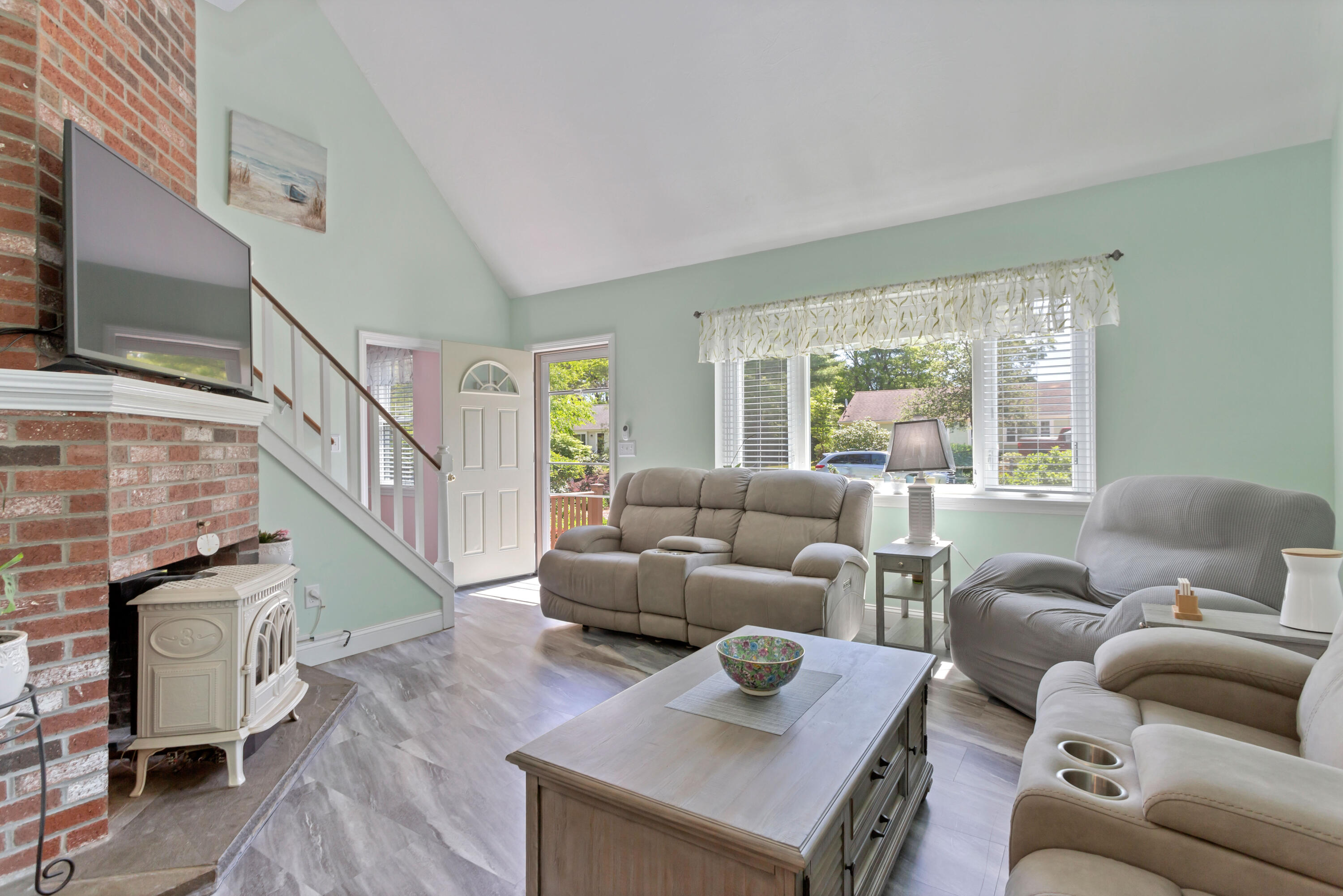 138 Gunstock Road Osterville, MA 02655 - Photo 5 of 47 a living room with furniture and a flat screen tv