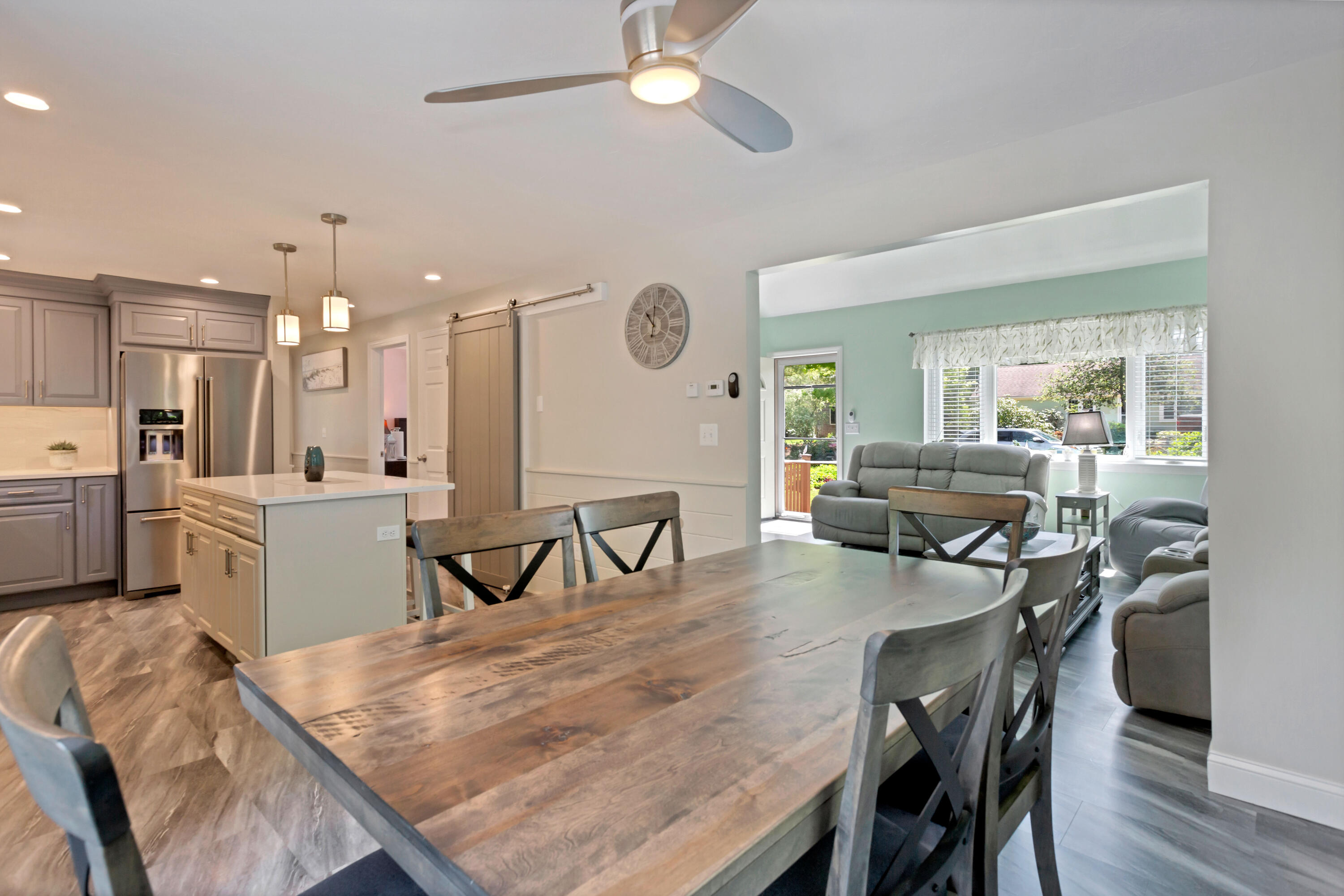 138 Gunstock Road Osterville, MA 02655 - Photo 8 of 47 a living room with furniture and kitchen view