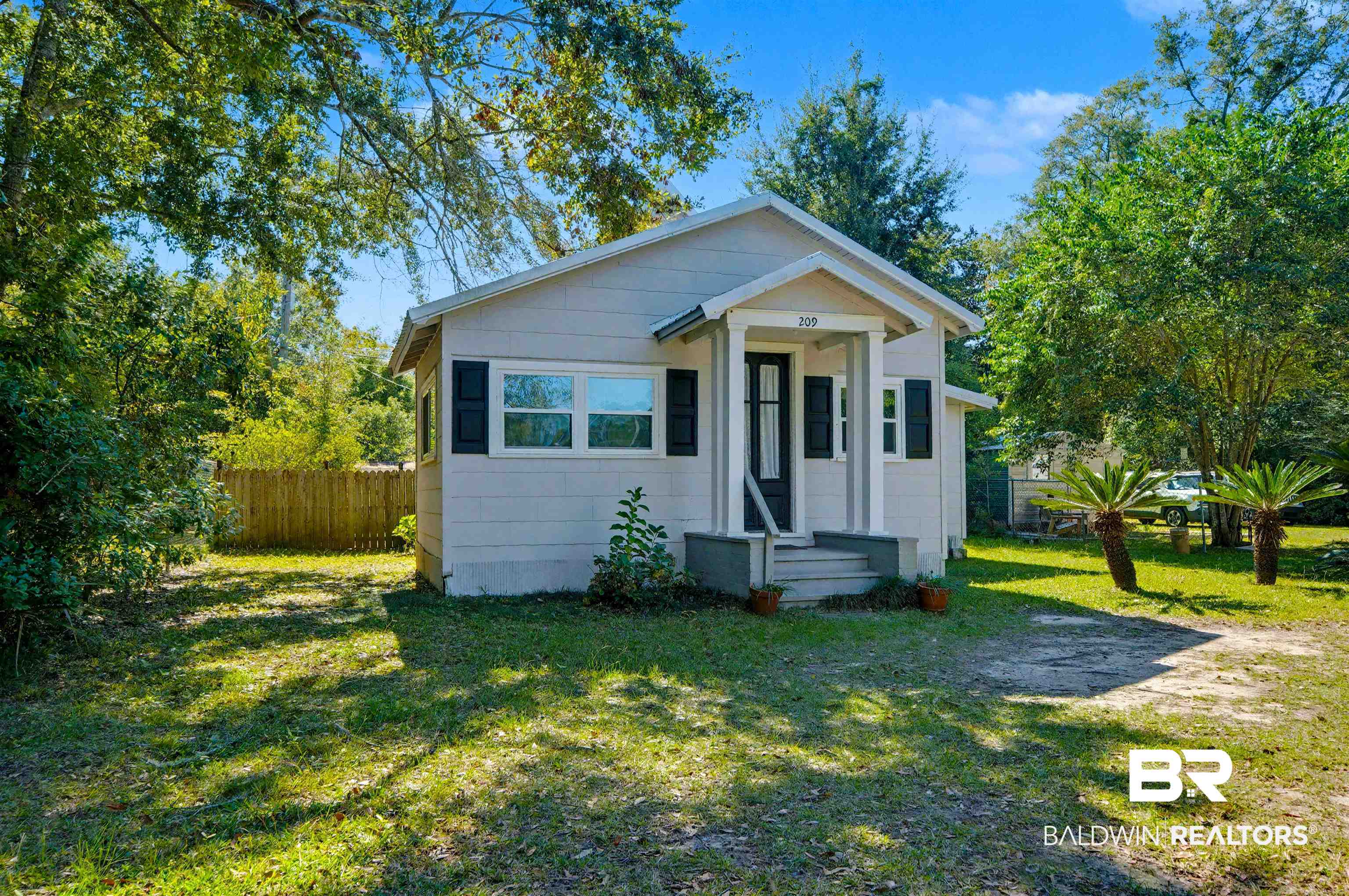 209 West Magnolia Avenue Foley, AL 36535 - Photo 2 of 23 View of bungalow-style house
