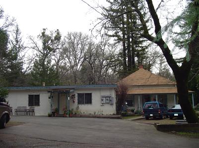 499 White Cottage Road South Angwin, CA 94508 - Photo 5 of 10 a car parked in front of white house