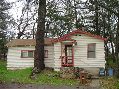 499 White Cottage Road South Angwin, CA 94508 - Photo 8 of 10 a front view of a house with a yard