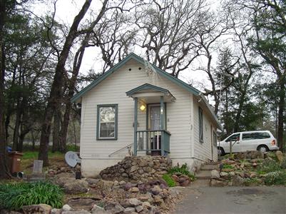 499 White Cottage Road South Angwin, CA 94508 - Photo 9 of 10 a front view of a house with garden