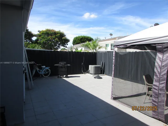 a view of outdoor space with seating area