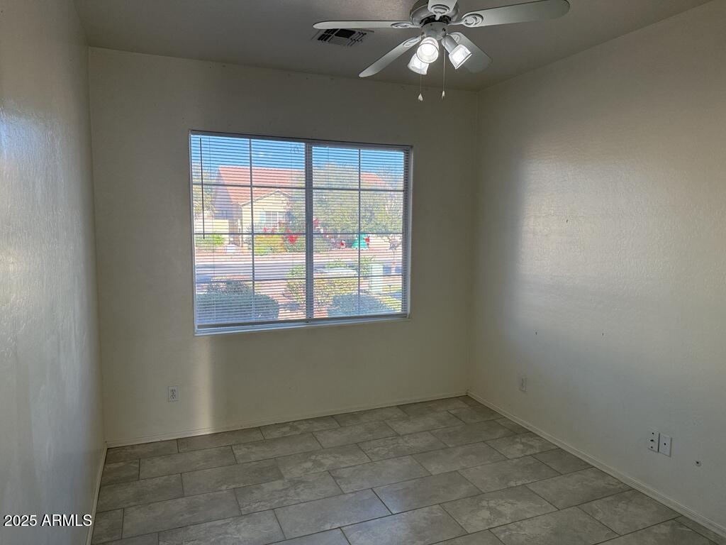 20915 East Via Del Rancho Queen Creek, AZ 85142 - Photo 15 of 23 a view of an empty room with a window