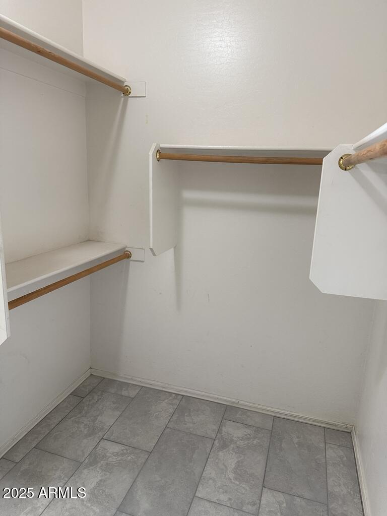 20915 East Via Del Rancho Queen Creek, AZ 85142 - Photo 19 of 23 a view of an empty walk in closet