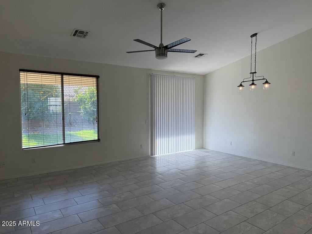 20915 East Via Del Rancho Queen Creek, AZ 85142 - Photo 5 of 23 a view of empty room with windows