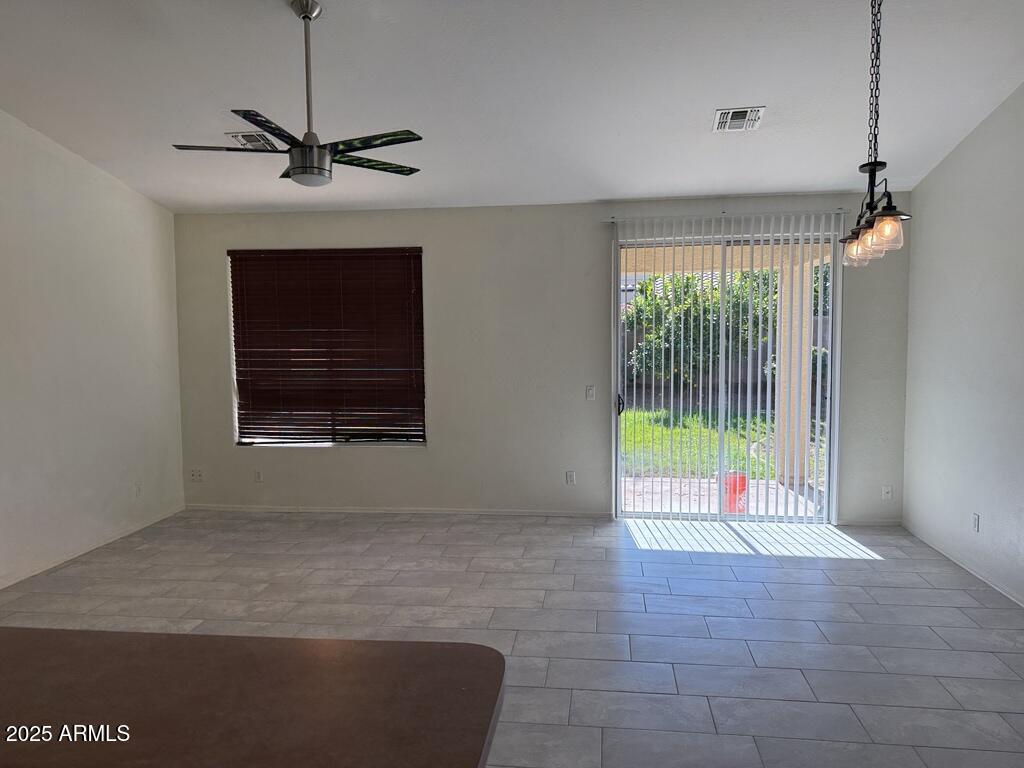 20915 East Via Del Rancho Queen Creek, AZ 85142 - Photo 6 of 23 a view of an empty room with a window