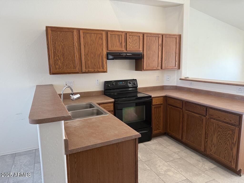 20915 East Via Del Rancho Queen Creek, AZ 85142 - Photo 7 of 23 a kitchen with a sink and cabinets