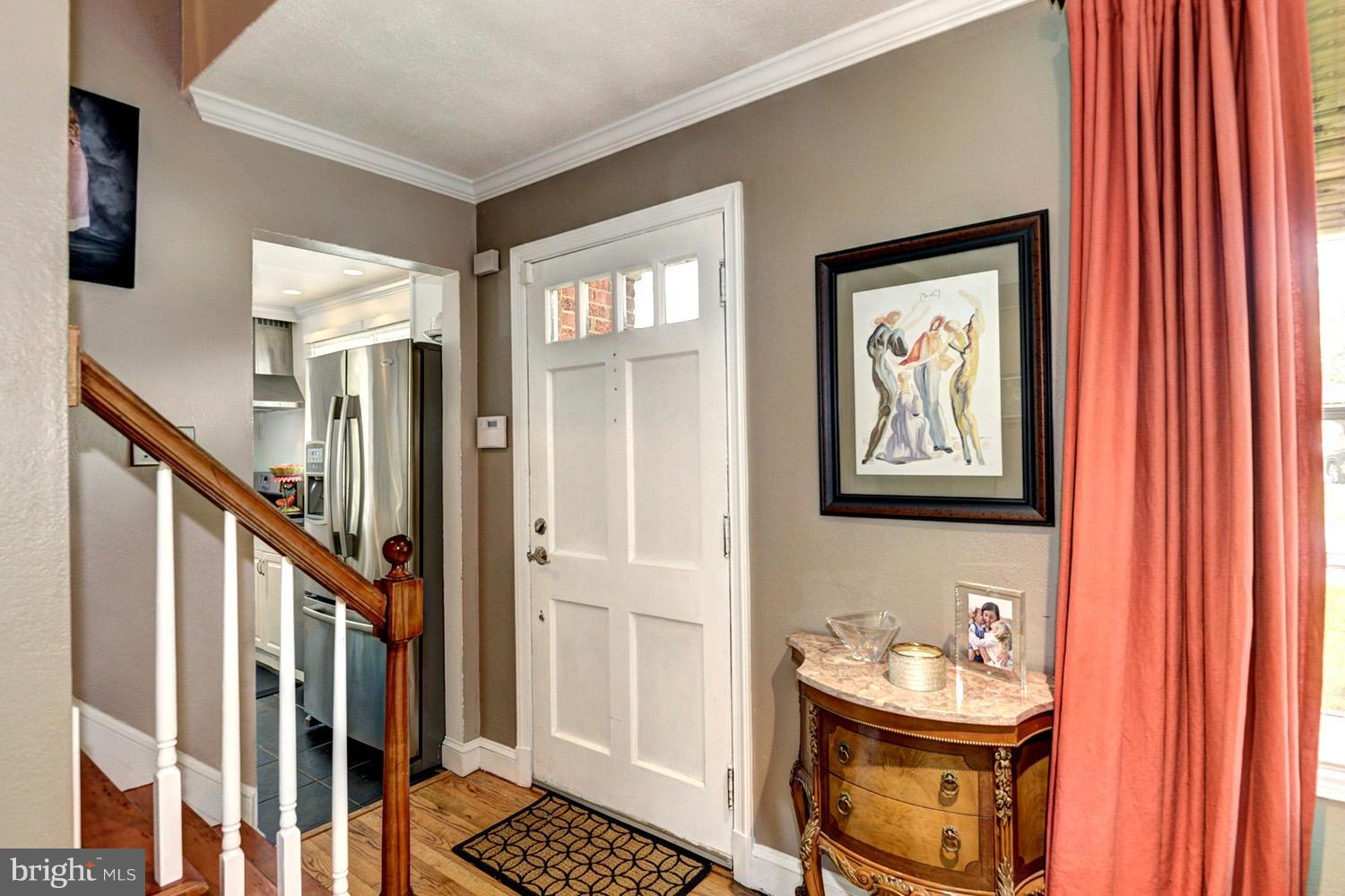 1240 Maple Road Arnold, MD 21012 - Photo 9 of 30 Foyer Introducing Classic Moldings and Millwork