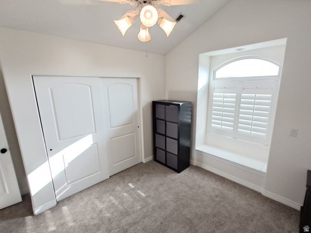 552 Sunset Crest Way Draper, UT 84020 - Photo 35 of 68 Unfurnished bedroom with vaulted ceiling, carpet flooring, ceiling fan, and a closet