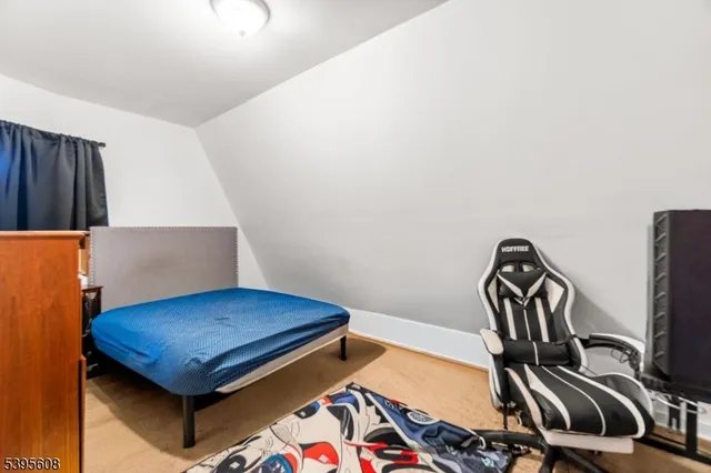 a view of room with wooden floor