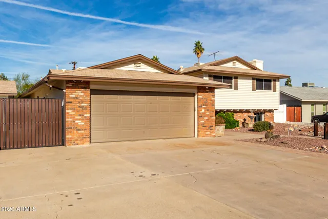 a front view of a house with a garage