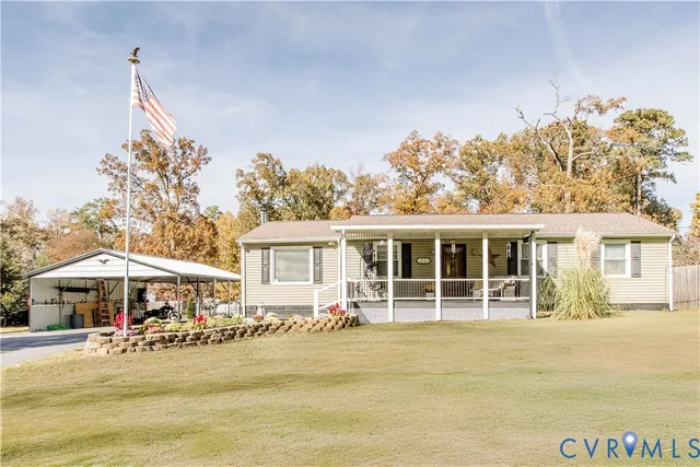 a front view of a house with yard