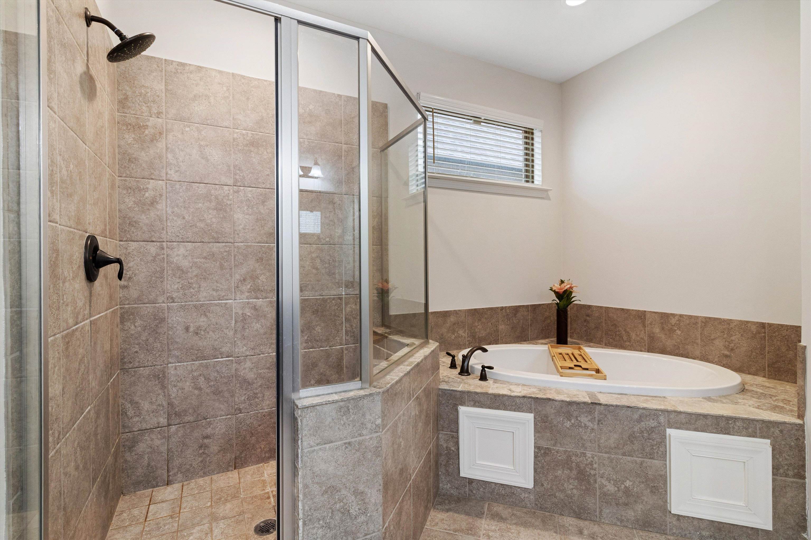 5504 Stonecrest Drive Olive Branch, MS 38654 - Photo 7 of 19 a bathroom with a granite countertop sink and a mirror