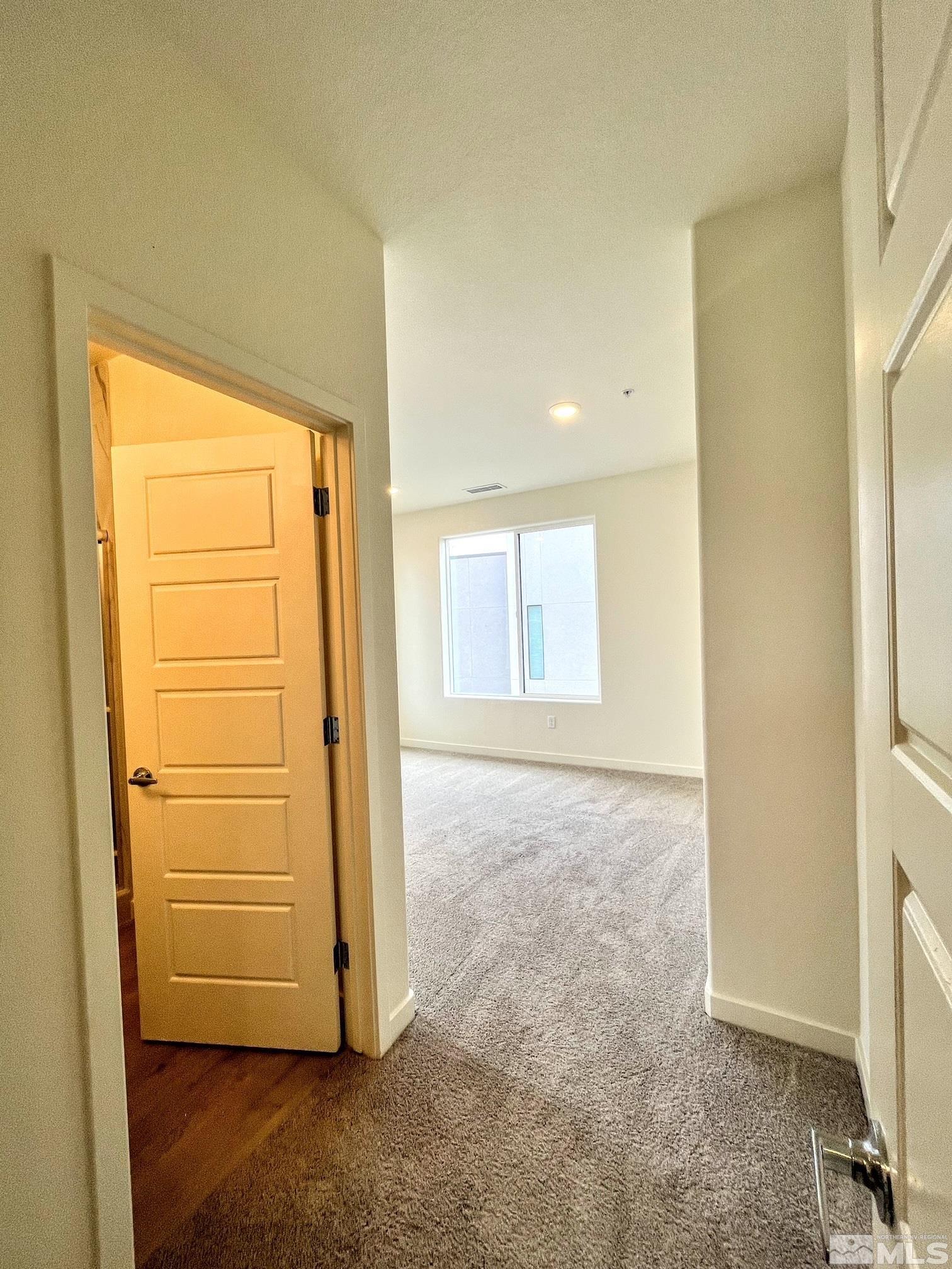 156 Rissone Lane, Unit LOT 33 Reno, NV 89503 - Photo 14 of 21 a view of a livingroom with a dresser