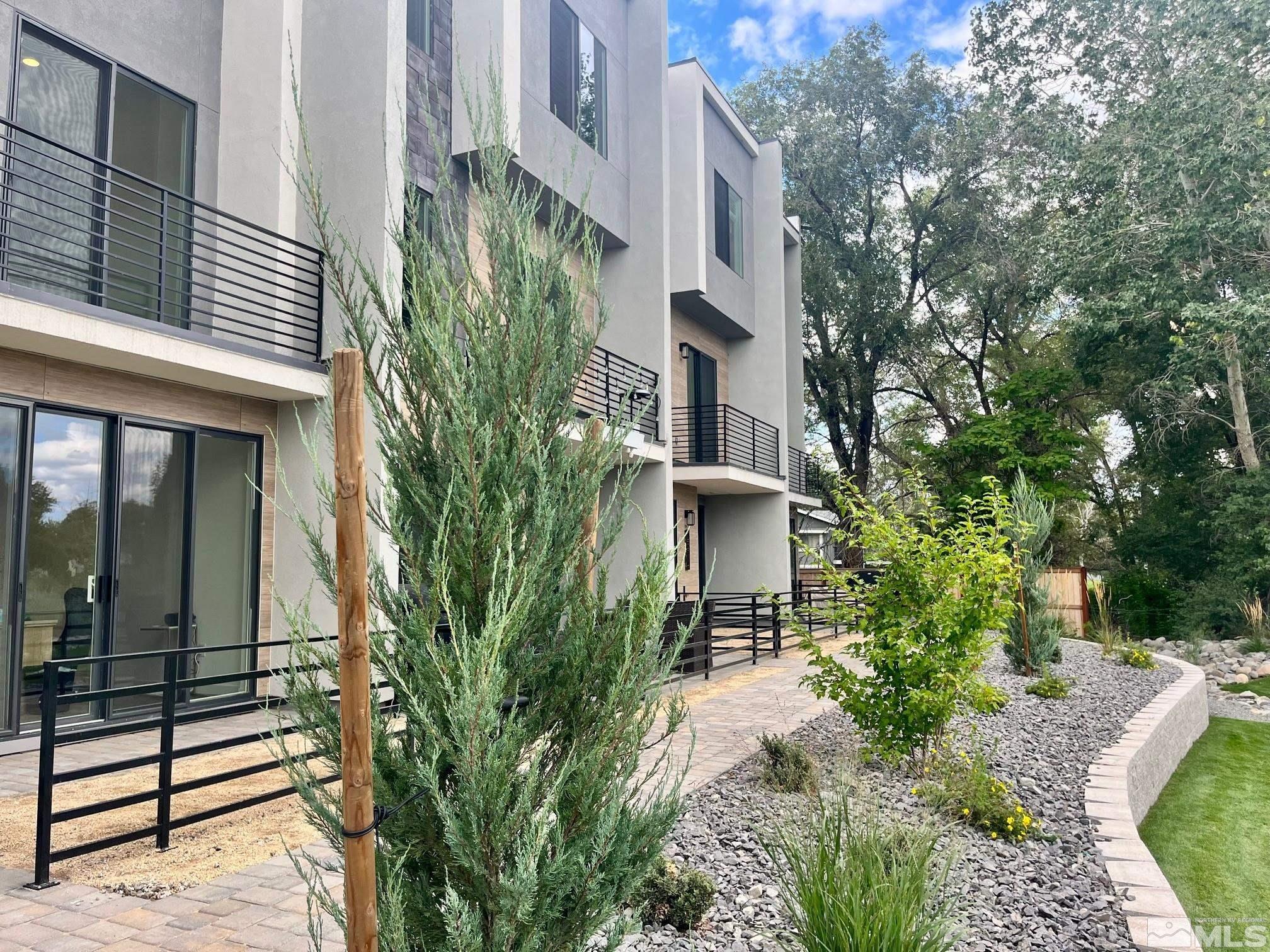 156 Rissone Lane, Unit LOT 33 Reno, NV 89503 - Photo 3 of 21 a front view of a house with a yard