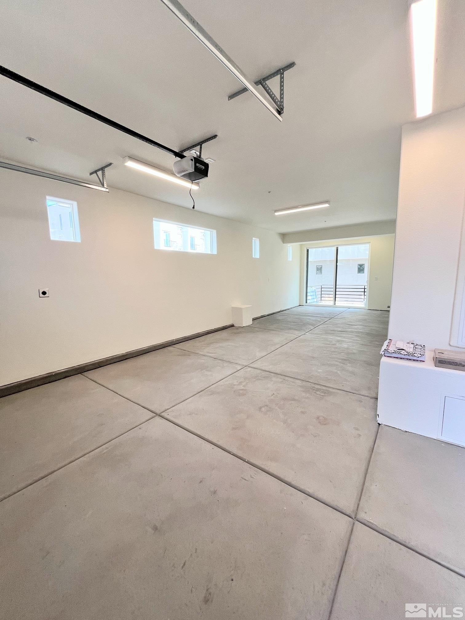 156 Rissone Lane, Unit LOT 33 Reno, NV 89503 - Photo 4 of 21 a view of a garage